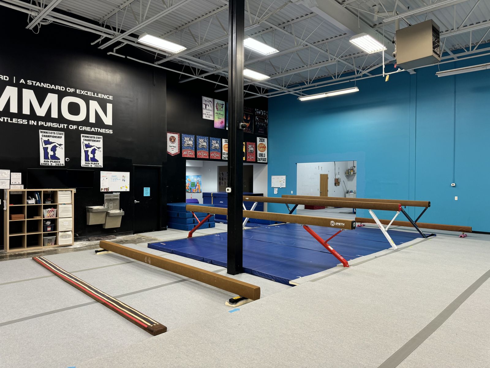 Beams and meet banners in the main gym