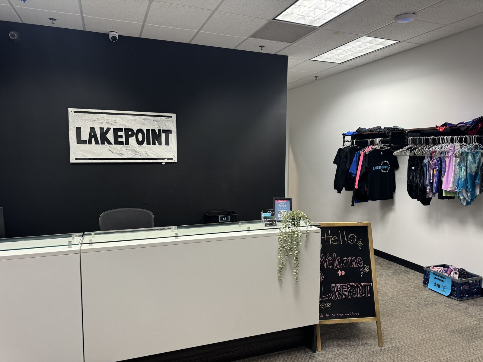 The Lake Point front desk and welcome sign