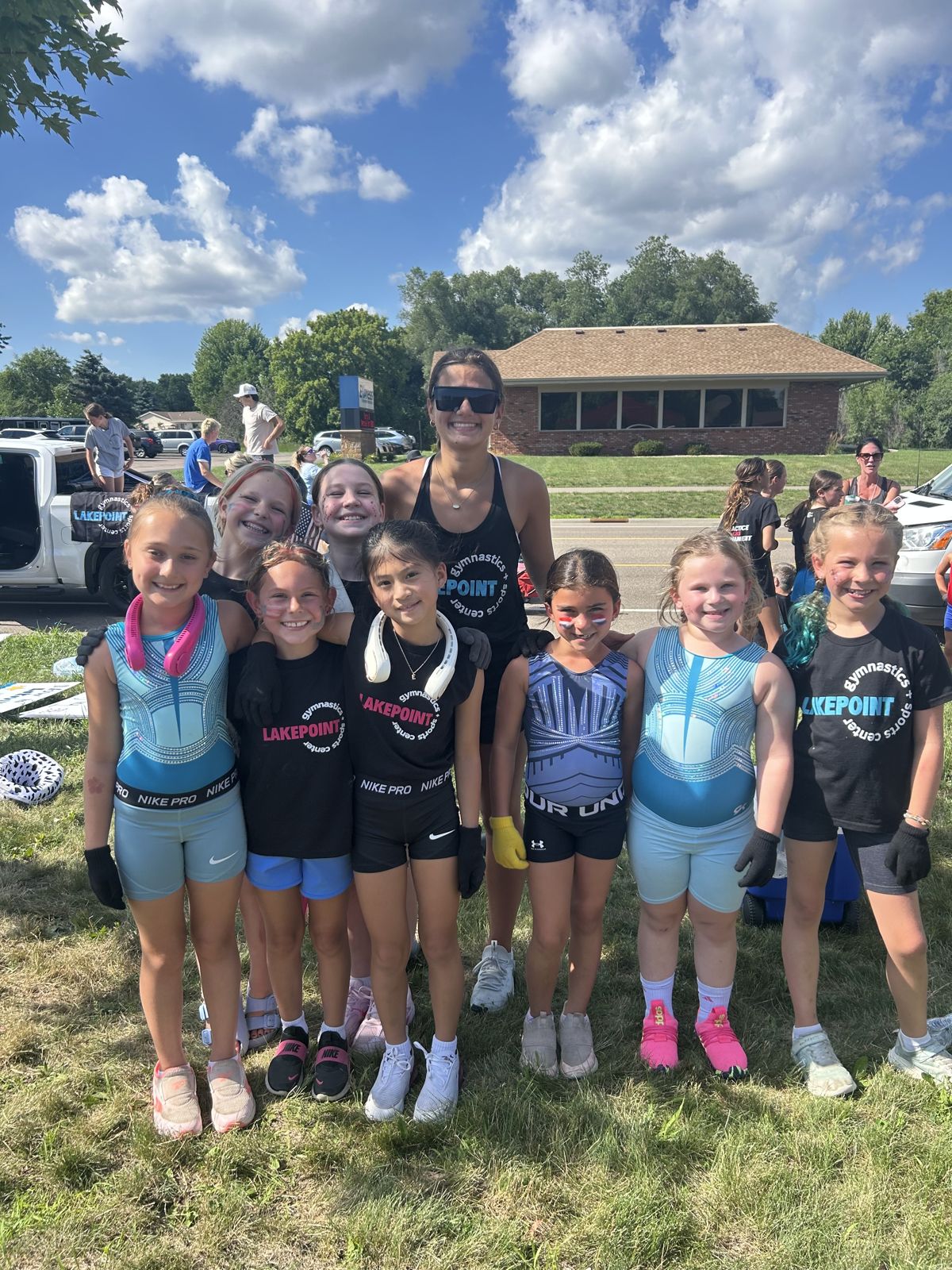 Lake Point gymnasts at a community parade